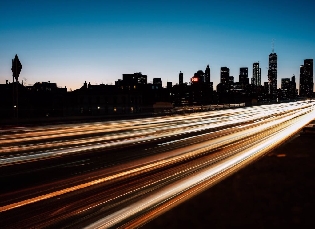 Streaks of light along a dark foreground